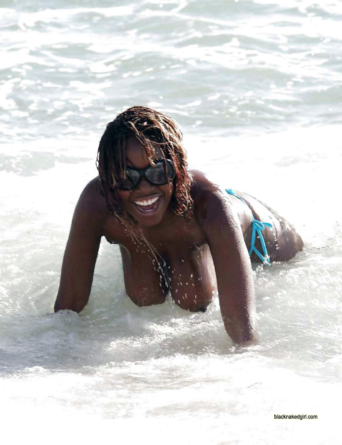 Hot Black Chick Nude On Beach - Very sexy black woman topless on the beach. Full-size image #3