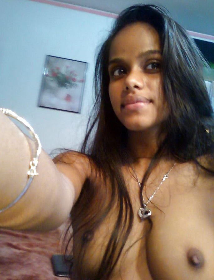 Amateur african teen shows her tiny tits in ghetto